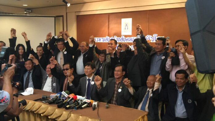 Members of the planned New Palangdharma Party at a Thursday launch event in Bangkok. The party vows to tackle corruption and push for national reforms. Photo: Matichon Members of the planned New Palangdharma Party at a Thursday launch event in Bangkok. The party vows to tackle corruption and push for national reforms. Photo: Matichon
