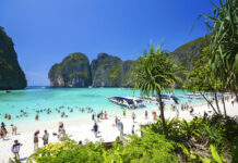 Thailand Misses Revenue Target Despite European Tourists Spending More per Trip Tourists at the popular Maya bay on Phi Phi Leh in Krabi province. Photo: Rajavi Omanee / Associated Press
