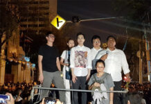 Top Cop Gives Green Light to Pro-Democracy Rally Standing on truck from left: Rangsiman Rome, Nuttaa Mahattana, Karn Pongprapaphan, Arnon Nampha, an unidentified woman and Sirawith Seritiwat during a March 24 rally.