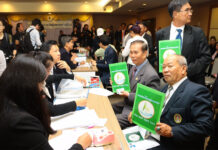 Dozens of New Parties Register For Next Election Representatives of the 'Thai Unity Party' register their name Friday morning at the Election Commission in Bangkok.