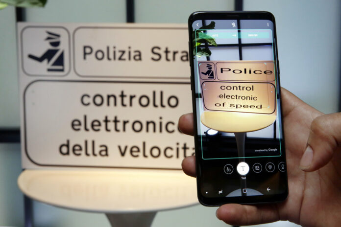 Samsung Galaxy S9 Plus The Bixby virtual assistant software of a Samsung Galaxy S9 Plus mobile phone translates a foreign language sign during a product preview in New York. Photo: Richard Drew / Associated Press