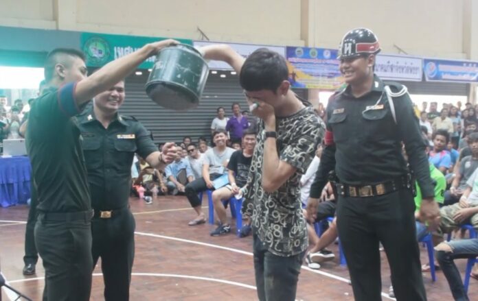 Potential recruits conscription lottery at a drafting station on April 5 in Phang Nga province.