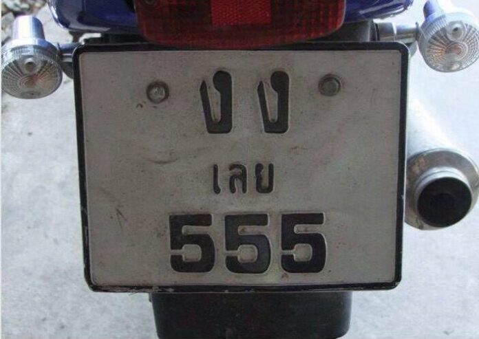 A motorcycle with a license plate “Confused hahaha.”