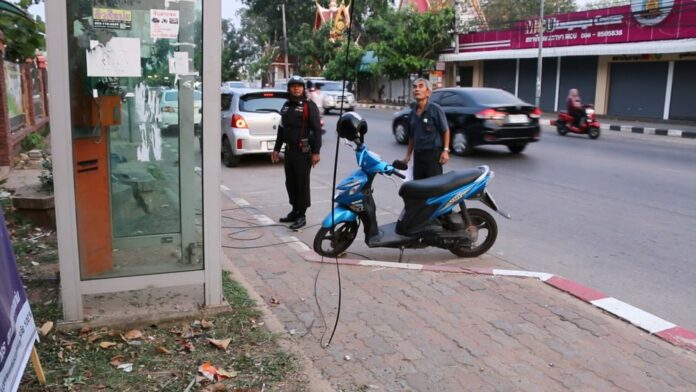 The scene Wednesday evening in Khon Kaen city, where Maneerat Charoen-ngao died after being struck by a hanging wire.