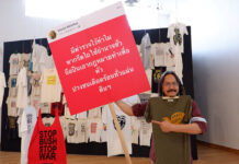 Take Risks, Include More: New Bangkok Art Center Head Pawit holds up some cutouts of Vasin’s politically charged Facebook statuses that visitors can hold up and take photos with.