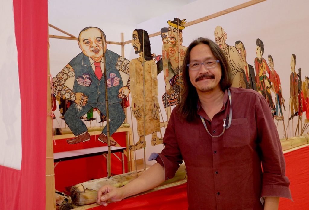 Pawit Mahasarinand, Bangkok Arts and Culture Centre director, with a caricature puppet of Gen. Prawit Wongsuwan, Minister of Defense. “Pawit with Prawit,” Pawit said. 