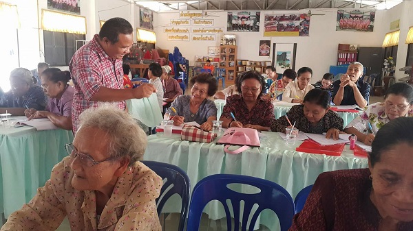 John and his class. Photo: Dejchat Phuangket / Courtesy