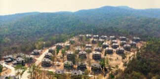Activists Hail Govt Vow to Return Doi Suthep Land to Wild An image showing a construction of residences on Doi Suthep in Chiang Mai province. Photo: Yahya Mankong / Facebook