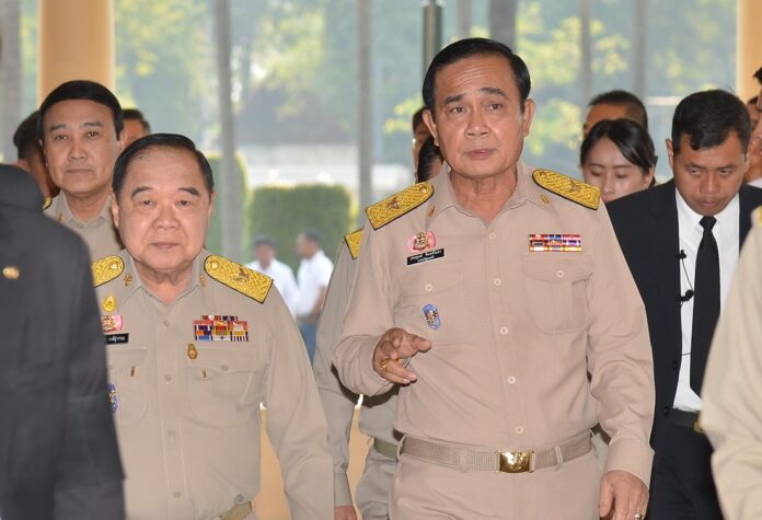 Prawit Wongsuwan walk alongside Prayuth Chan-ocha to a Cabinet meeting on Jan. 21, 2017.