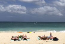 Philippine Island Once Called ‘Cesspool’ Reopens to Visitors Tourists sunbathe at a beach on Boracay island in April in central Aklan province, Philippines. Photo: Aaron Favila / Associated Press