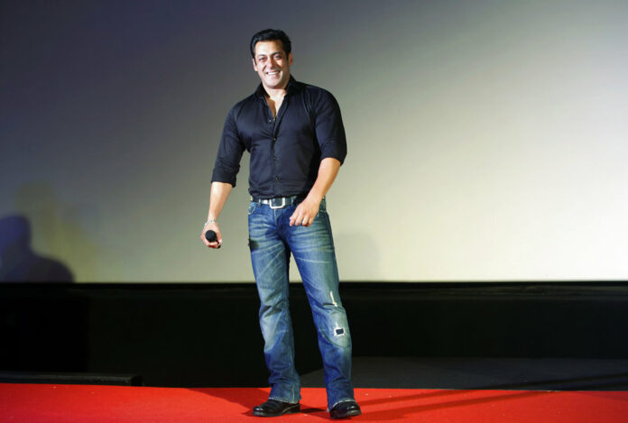 Indian Bollywood actor Salman Khan smiles as he attends the trailer launch of his movie 