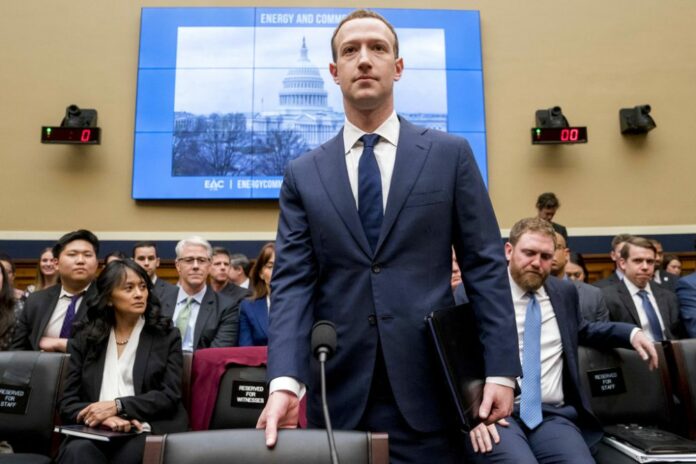 Facebook CEO Mark Zuckerberg arrives in April to testify before a House Energy and Commerce hearing on Capitol Hill in Washington. Photo: Andrew Harnik / Associated Press