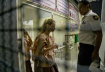 Russian ‘Sex Guru,’ and Followers Make Thai Court Appearance Anastasia Vashukevich, center, walks into a prison transport vehicle outside a courthouse in Pattaya, south of Bangkok, Thailand, on Tuesday. Photo: Gemunu Amarasinghe / Associated Press
