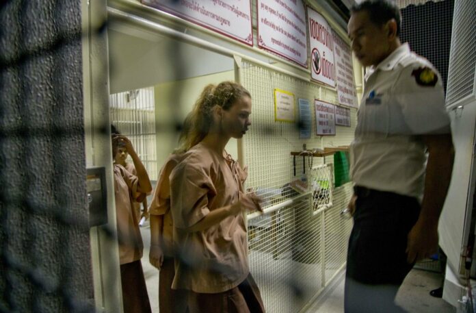 Anastasia Vashukevich, center, walks into a prison transport vehicle outside a courthouse in Pattaya, south of Bangkok, Thailand, on Tuesday. Photo: Gemunu Amarasinghe / Associated Press Anastasia Vashukevich, center, walks into a prison transport vehicle outside a courthouse in Pattaya, south of Bangkok, Thailand, on Tuesday. Photo: Gemunu Amarasinghe / Associated Press