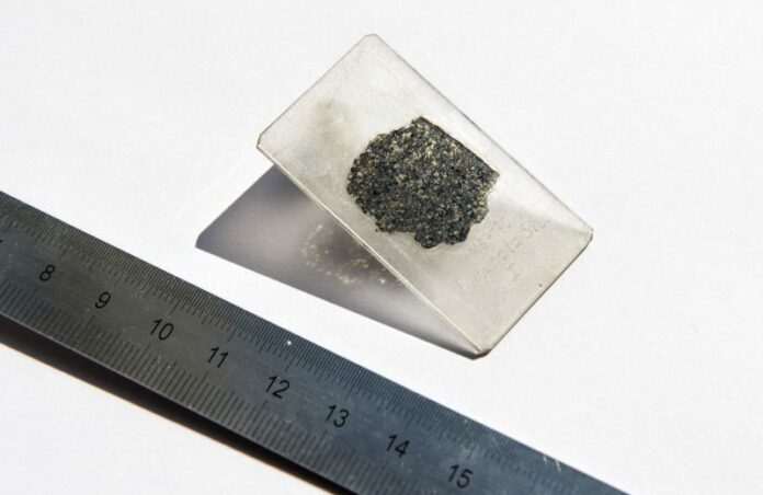 A thin slice of the meteorite sample from a meteorite that fell to Earth more than a decade ago. Photo: Hillary Sanctuary / Associated Press