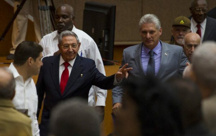Cuba's President Raul Castro enters the National Assembly followed by his successor Miguel Diaz-Canel for the start of two-day legislative session in Havana, Cuba. Photo: Irene Perez / Associated Press