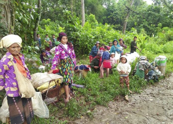 Kachin civilians displaced by fighting between the Myanmar military and Kachin guerrillas take shelter in a jungle close to Tanai, northern Kachin state, Myanmar Thursday. Photo: Labram Hkun Awng / Associated Press