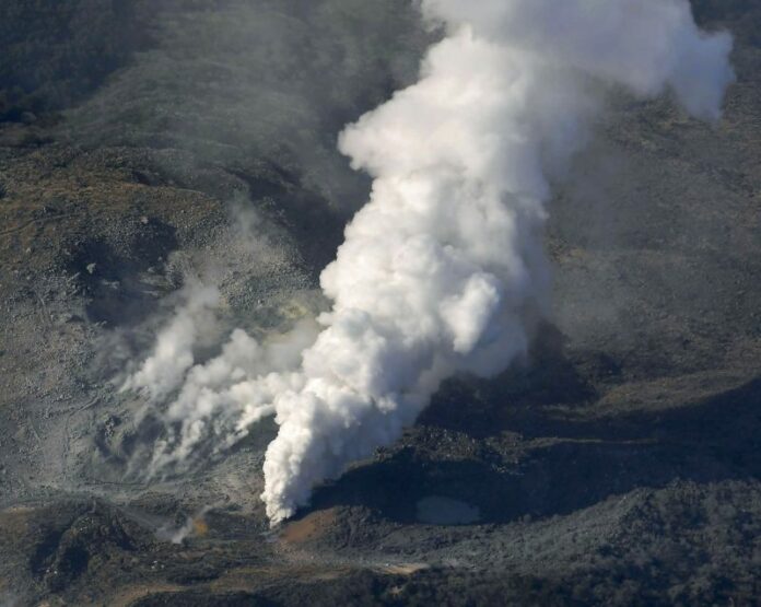 Volcanic smoke billows from Mt. Io, part of the Kirishima mountain range on Japan’s southern main island of Kyushu, taken over Ebino city, Miyazaki prefecture. Kyodo News / Associated Press