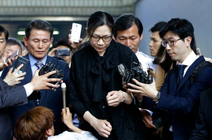 Former Korean Air executive Cho Hyun-ah, center leaveing the Seoul High Court in Seoul, South Korea. Photo: Lee Jin-man / Associated Press