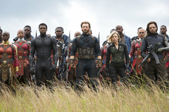 This image released by Marvel Studios shows, front row from left, Danai Gurira, Chadwick Boseman, Chris Evans, Scarlet Johansson and Sebastian Stan in a scene from 