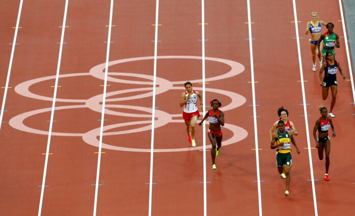 In this Thursday, Aug. 9, 2012 file photo, South Africa's Caster Semenya leads in the women's 800-meter semifinal during the athletics in the Olympic Stadium at the 2012 Summer Olympics, London. Photo: Daniel Ochoa De Olza / Associated Press