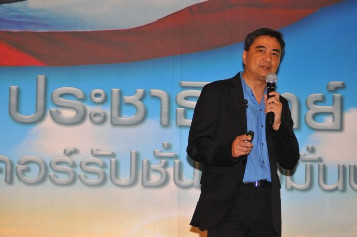 Democrat Party chairman Abhisit Vejjajiva speaks in April.