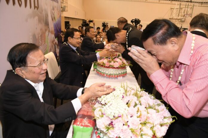 Pheu Thai members offer Songkran greetings to their party elders on Wednesday