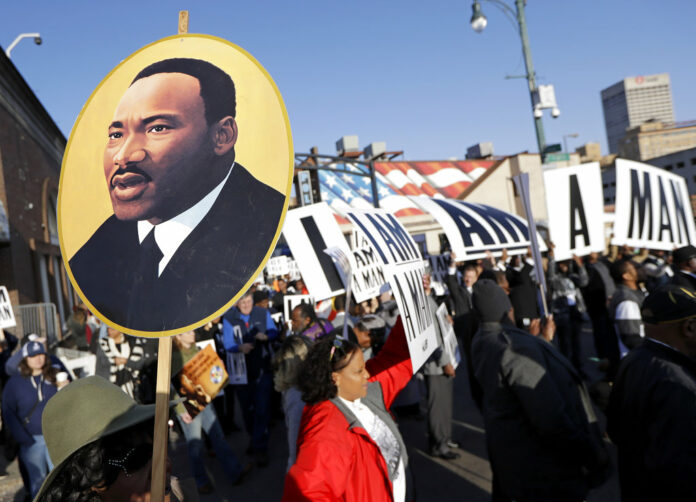 People gather for events commemorating the 50th anniversary of the assassination of the Rev. Martin Luther King Jr. on Wednesday in Memphis, Tennessee, where King was assassinated in 1968. Photo: Mark Humphrey / Associated Press