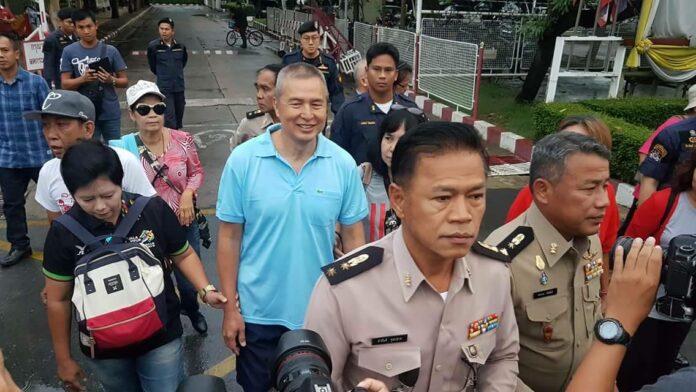 Somyot Prueksakasemsuk, at center in blue shirt, leaves the Bangkok Remand Prison early Monday morning. Photo: Watthana Praisonta