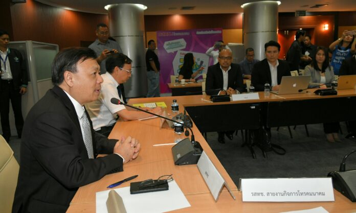 Representatives from True Corp. attend a Tuesday hearing at the National Broadcasting and Telecommunications Commission offices in Bangkok. Photo: Matichon