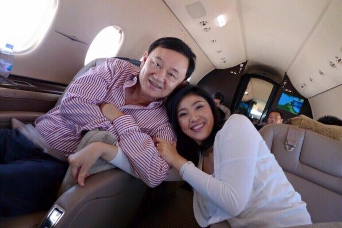 Thaksin Shinawatra and Yingluck Shinawatra are seen in a July 26, 2016, photo posted online by Yingluck. Photo: Yingluck Shinawatra / Facebook