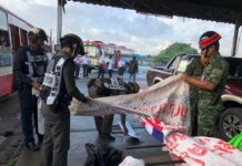 Activist Detained, Banners Seized in May Day Rallies