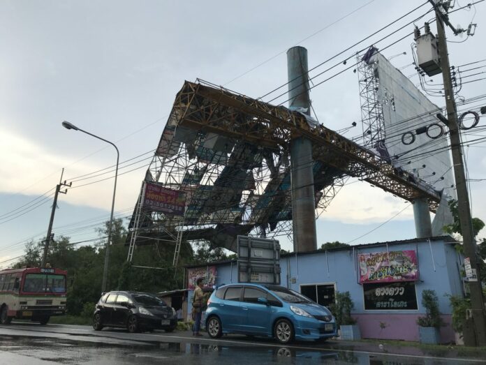 An advertisement billboard Sunday in Nonthaburi after a storm.