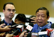 Philippine Ambassador Banished by Kuwait Returns to Manila Philippine Ambassador to Kuwait Renato Villa, right, talks to reporters beside Philippine Foreign Secretary Alan Peter Cayetano at Manila's international airport. Photo: Aaron Favila / Associated Press