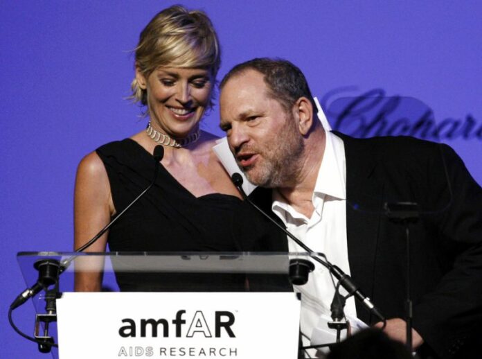 Sharon Stone, left, looks on as American producer Harvey Weinstein, right, speaks at the 62nd Cannes International film festival, in Antibes, southern France. Photo: Matt Sayles / Associated Press
