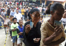 Policeman Accused of Killing 3 at Party in East Timor People queue up to give their votes at a polling station in May in Dili, East Timor. Photo: Kandhi Barnez / Associated Press