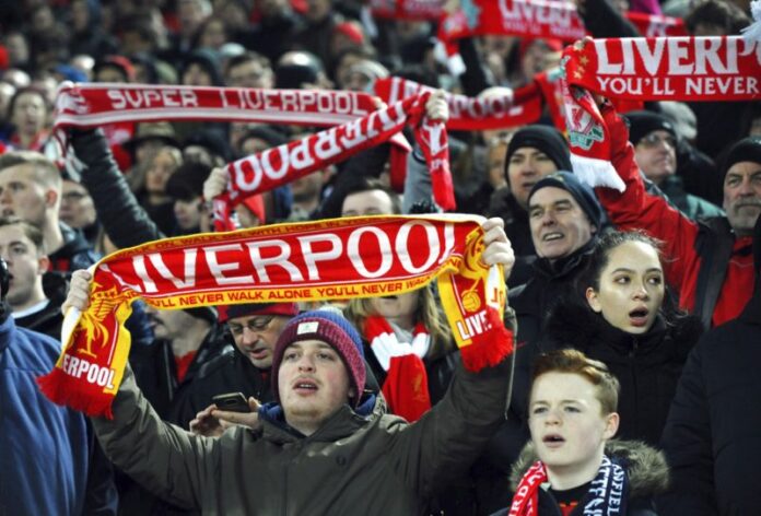Liverpool fans at the Kop singing 