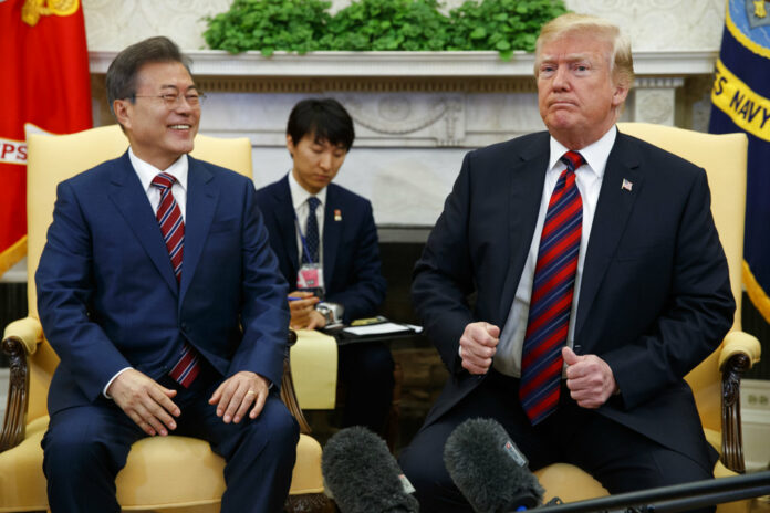 President Donald Trump meets with South Korean President Moon Jae-In in the Oval Office of the White House, Tuesday in Washington. Photo: Evan Vucci / Associated Press