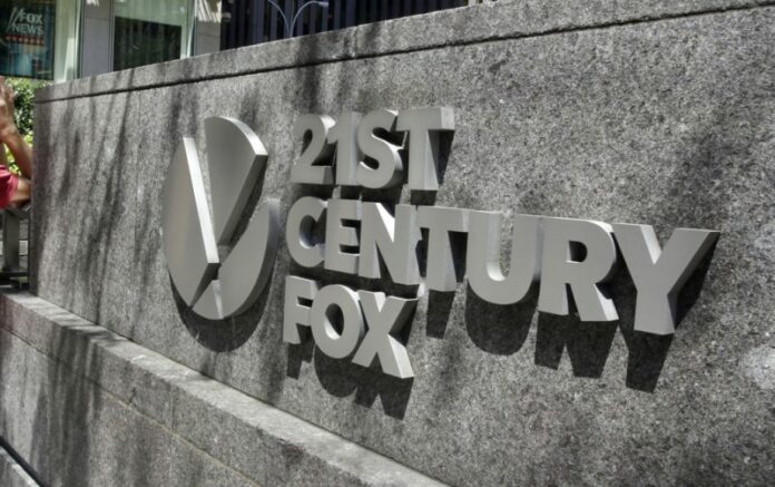 The Twenty-First Century Fox sign outside of the News Corporation headquarters building in New York. Photo: Richard Drew / Associated Press