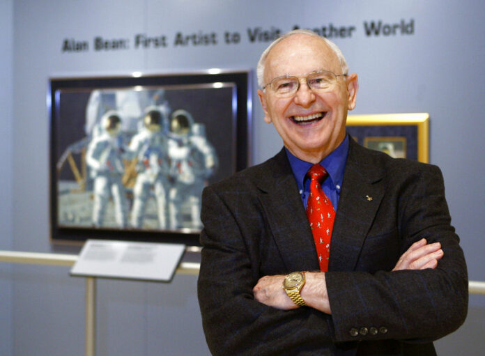 Alan Bean, the fourth man to walk on the moon, is shown during a preview of his work in 2008 at the Lyndon Baines Johnson Library and Museum in Austin, Texas. Photo: Harry Cabluck / Associated Press Alan Bean, the fourth man to walk on the moon, is shown during a preview of his work in 2008 at the Lyndon Baines Johnson Library and Museum in Austin, Texas. Photo: Harry Cabluck / Associated Press
