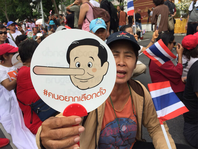 Protesters prepare for a march to the Government House in May 2018 to mark the fourth anniversary of the 2014 coup. They were blocked from reaching their destination.