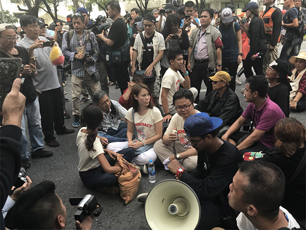 Protest leader Nutta 'Bow' Mahattana joins Arnon Nampha with protesters.