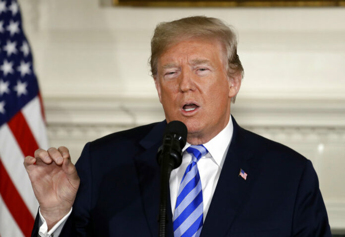 President Donald Trump delivers a statement on the Iran nuclear deal from the Diplomatic Reception Room of the White House, Tuesday, May 8, 2018, in Washington. Photo: Evan Vucci / Associated Press