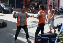 Grab Must Stand Down to End Taxi Wars: Military A still image from a 2017 video clip of two motorcycle taxis fighting in Pattaya. Photo: My Pattaya / Facebook