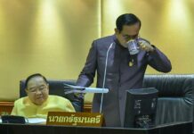 Prayuth Pleads to Be Spared From Insult, Triggers Backlash Junta chairman Prayuth Chan-ocha pauses for a sip Thursday during an hour-long speech to parliament on his 3 trillion-baht budget proposal as his deputy Prawit Wongsuwan looks on.