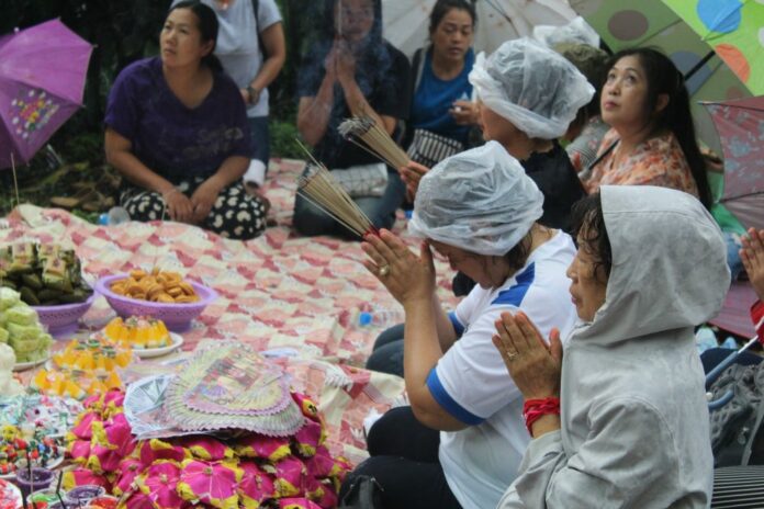 Families and relatives of the missing crew on Monday held a prayer session at the cave's entrance