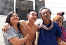 Letters Reveal UN Exchange Over Thai Royal Defamation Lese majeste convict Jatupat 'Pai' Boonpattararaksa poses for a photo with his parents on March 22 after attending a court hearing on violating the junta's ban on protests.
