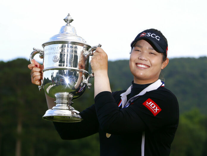 Ariya Jutanugarn, of Thailand, holds up the trophy after winning in a four hole playoff during the final round of the U.S. Women's Open golf tournament Sunday at Shoal Creek. Photo: Butch Dill / Associated Press