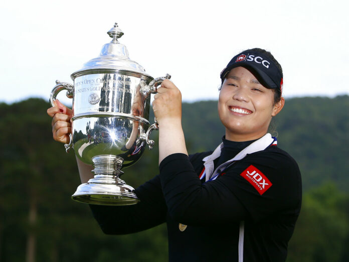 Ariya Jutanugarn, of Thailand, holds up the trophy after winning in a four hole playoff during the final round of the U.S. Women's Open golf tournament Sunday at Shoal Creek. Photo: Butch Dill / Associated Press Ariya Jutanugarn, of Thailand, holds up the trophy after winning in a four hole playoff during the final round of the U.S. Women's Open golf tournament Sunday at Shoal Creek. Photo: Butch Dill / Associated Press