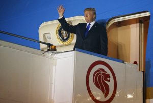 President Donald Trump arrives at Paya Lebar Air Base for a summit with North Korea's leader Kim Jong Un in Singapore. Photo: Evan Vucci / Associated Press